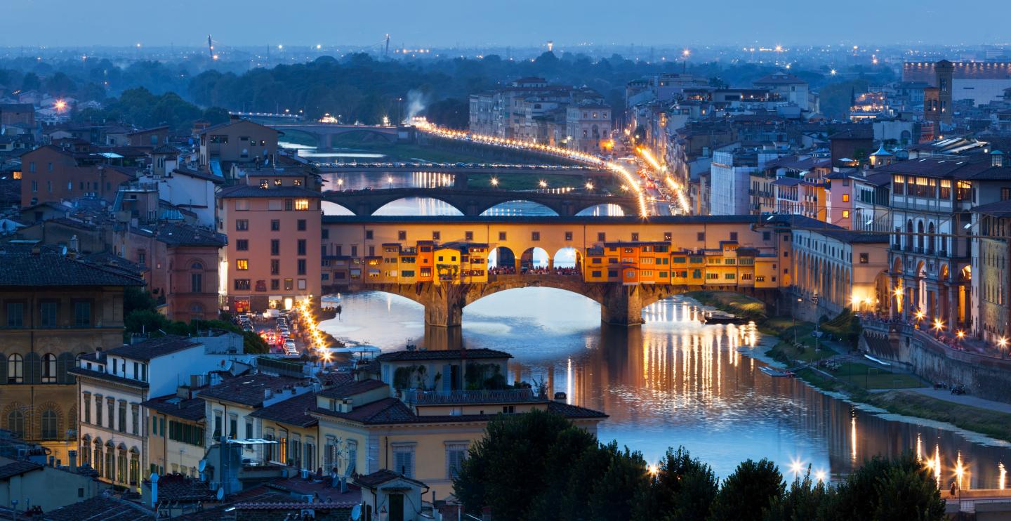 Florence, Italy night skyline. Ponte Vecchio bridge over Arno River