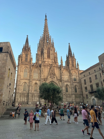 Cathedral of Barcelona that has three spires on an evening with clear blue skies
