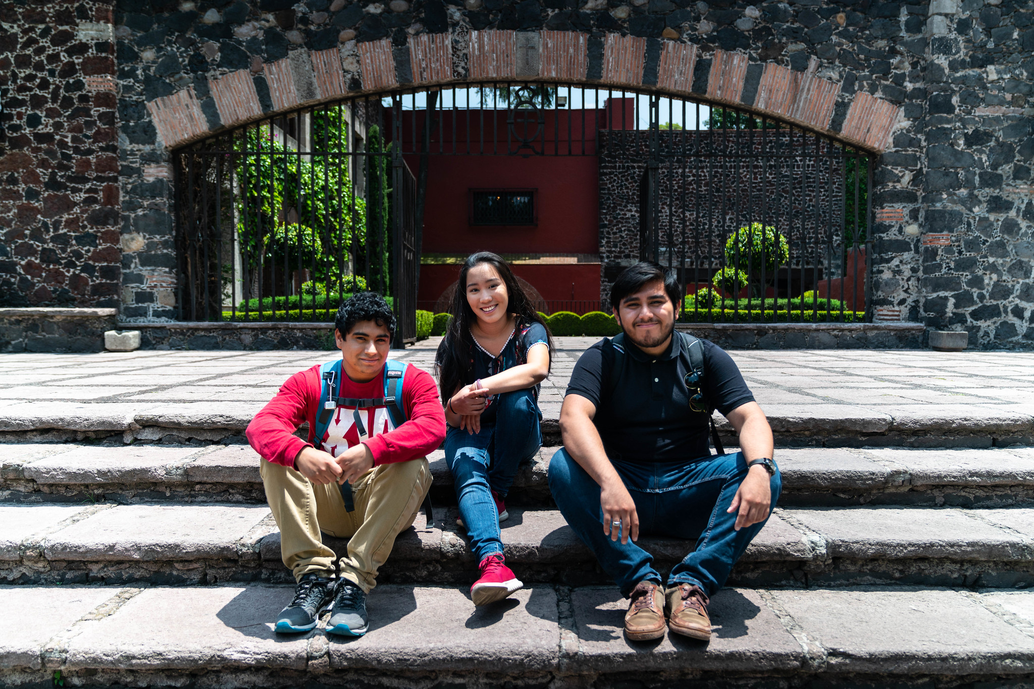 students sitting on steps in Mexico