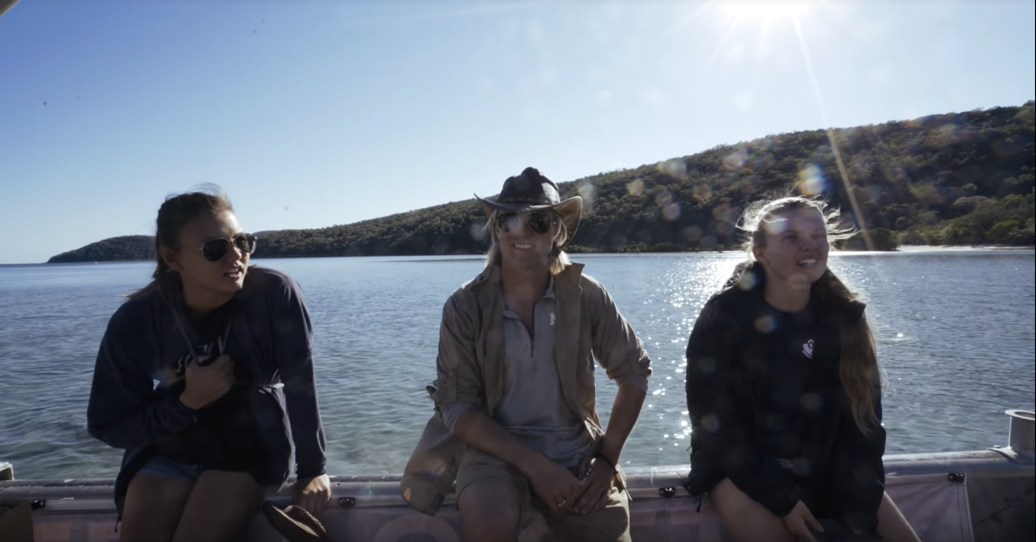 Three students on a boat in Australia