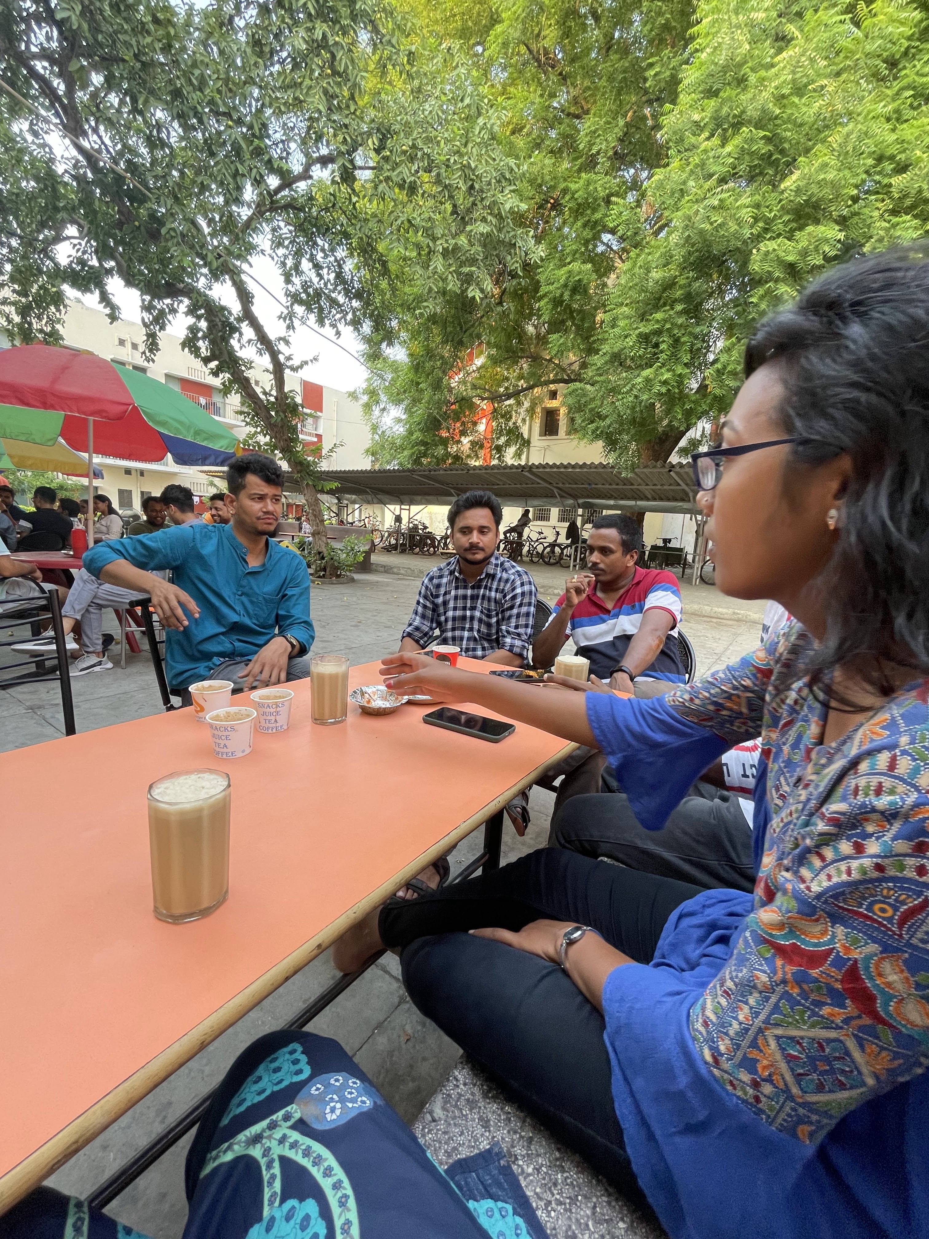 lab mates drinking chai with Neosha