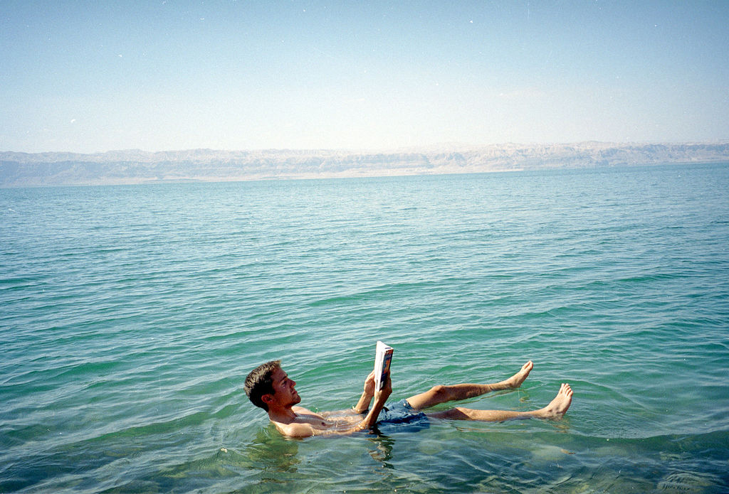 person floating in Dead Sea