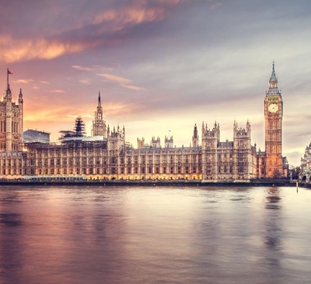 Big Ben clocktower in background with the river in the foreground