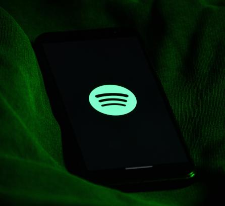 phone with spotify logo