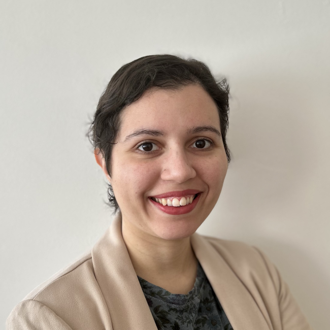 Gabriela Diaz headshot in beige blazer