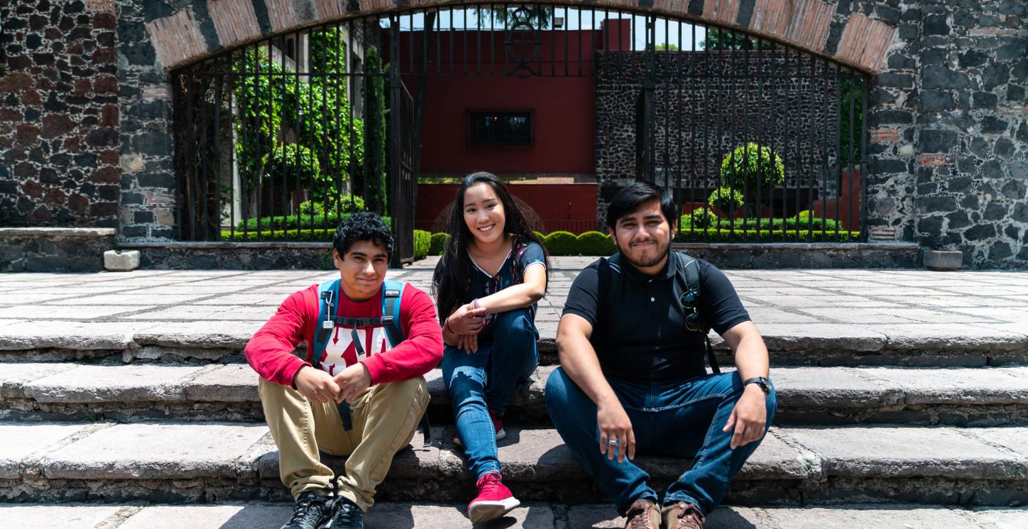 students sitting on steps in Mexico