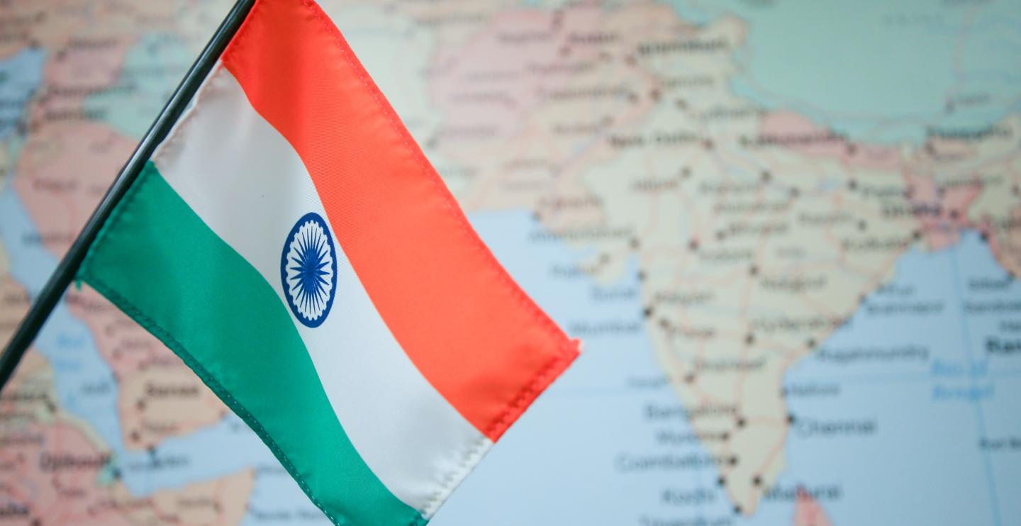 Indian flag in front of map