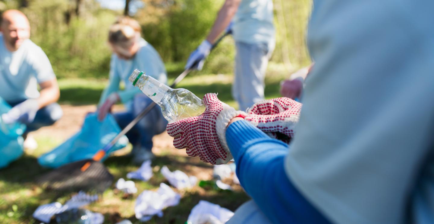 volunteers cleaning a park