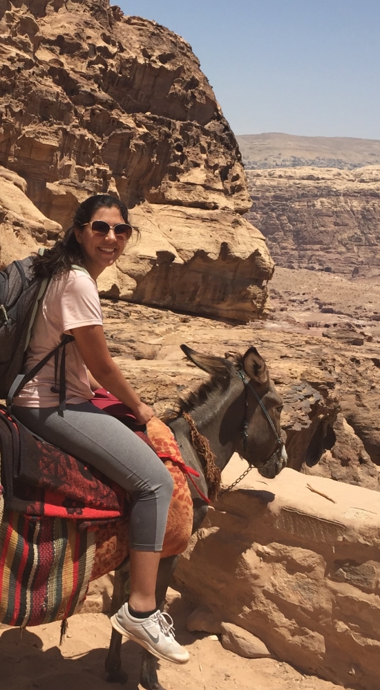 Yara riding a mule