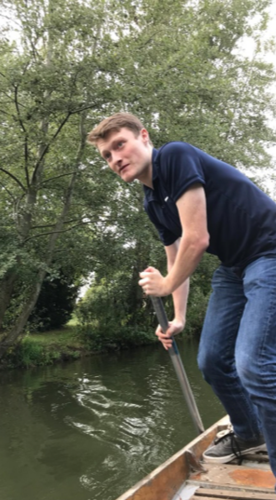 Student on a punting boat