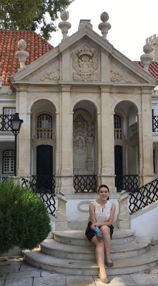Katherine in front of building in Portugal