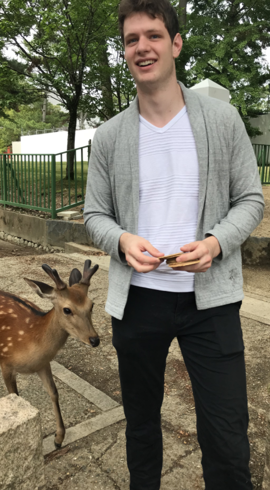 Tim with deer in Japan