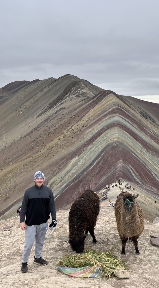 Donald Stralkus at Vinicunca with two alpacas