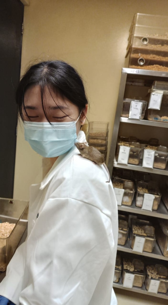 Amy Wang with rat
