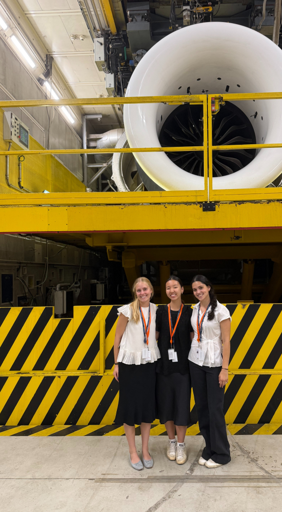Skye W and two others in a factory in France