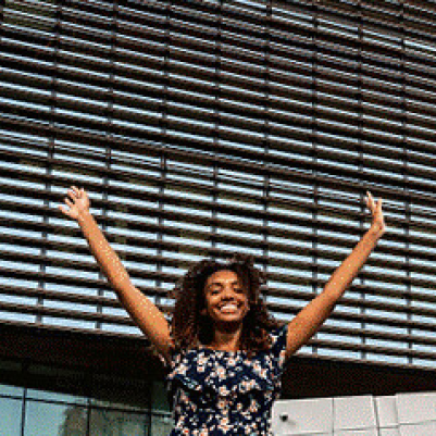 Student in front of intership building in China