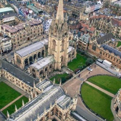 Aerial view of Oxford, ranging from old historic buildings and bright, lush yards of grass