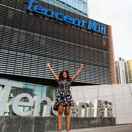 Student in front of itnership building in China
