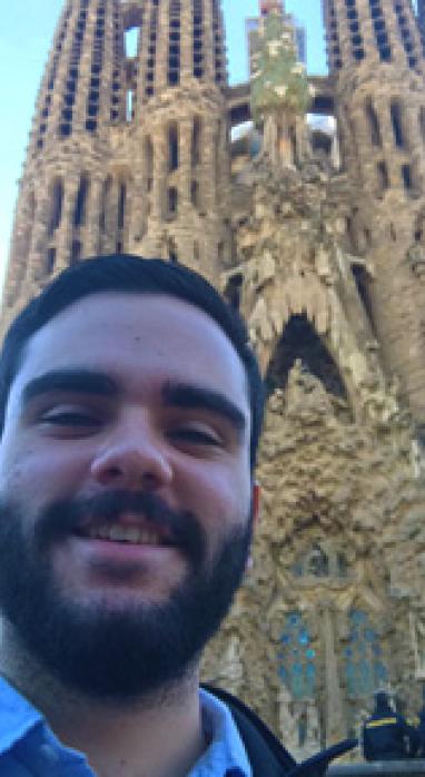 Marco Villareal standing in front of an old cathedral in Spain