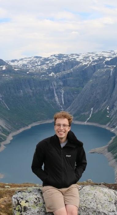 Fischer in front of a fjord in Norwya