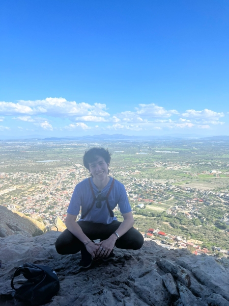 Fernando at the top of a mountain