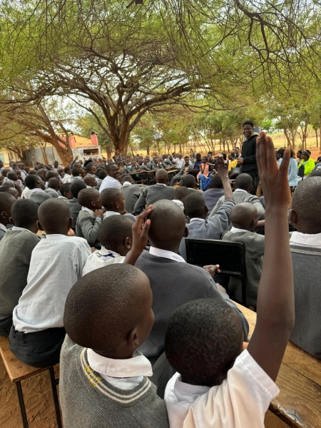 Nickie Mpofu with students