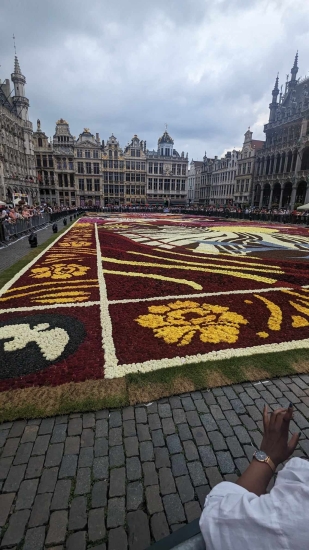 Pattern design on the ground surrounded by buildings with spires in Luxembord